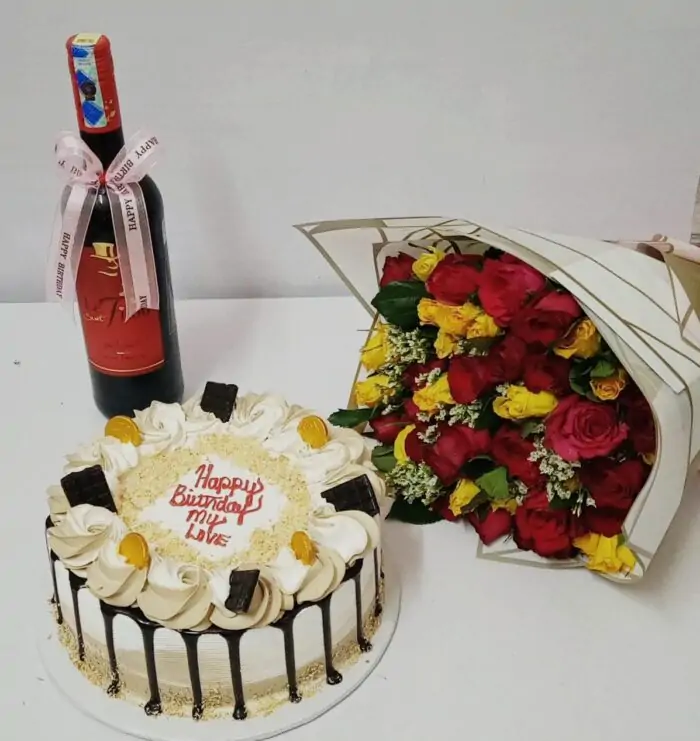 bouquet-of-flowers-birthday-cake-and-wine