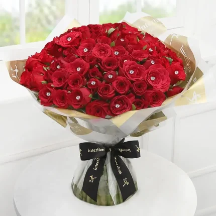 dazzling-100-red-roses-hand-tied-bouquet